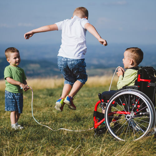 three young boys playing jumprope in open field All for Kids Home Health Colorado